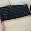 Corded reduced reach Keyboard with number pad on left side