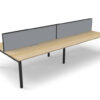 Double sided infinity desk with enviroboard oak top and black profile legs